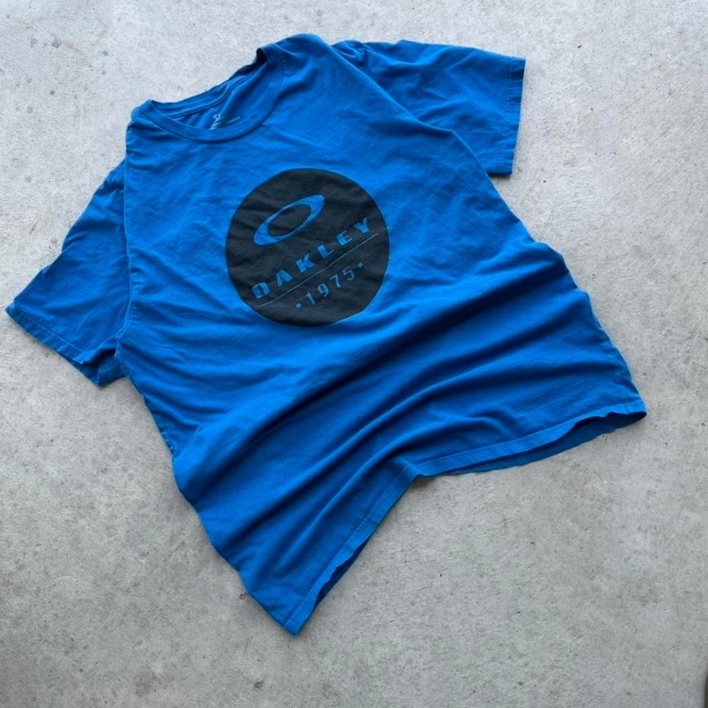 Vintage Oakley 1975 Blue T-shirt Essential - Picture 3 of 6